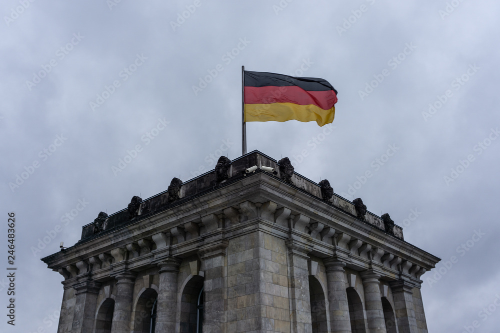 Reichstag building (Bundestag, the German Parliament) in a cloudly day - Berlin, Germany