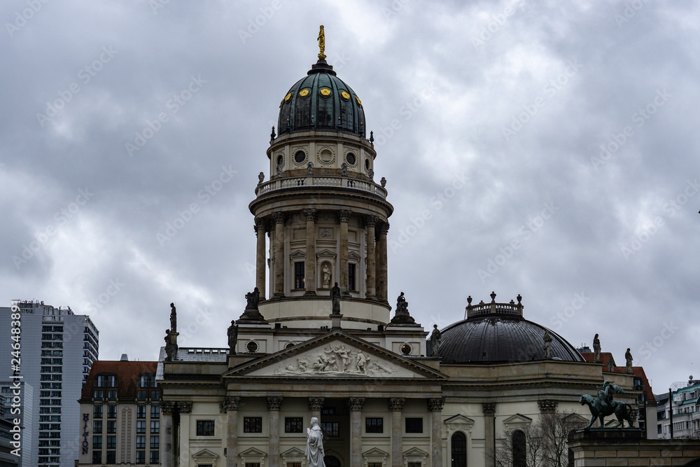 Gendarmenmarkt square with Berlin Concert Hall and French Cathedral in a rainy day, Berlin, Germany
