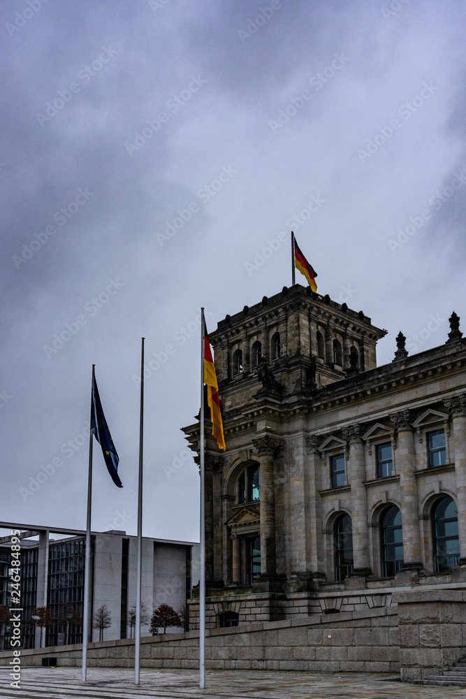 Reichstag building (Bundestag, the German Parliament) in a cloudly day - Berlin, Germany