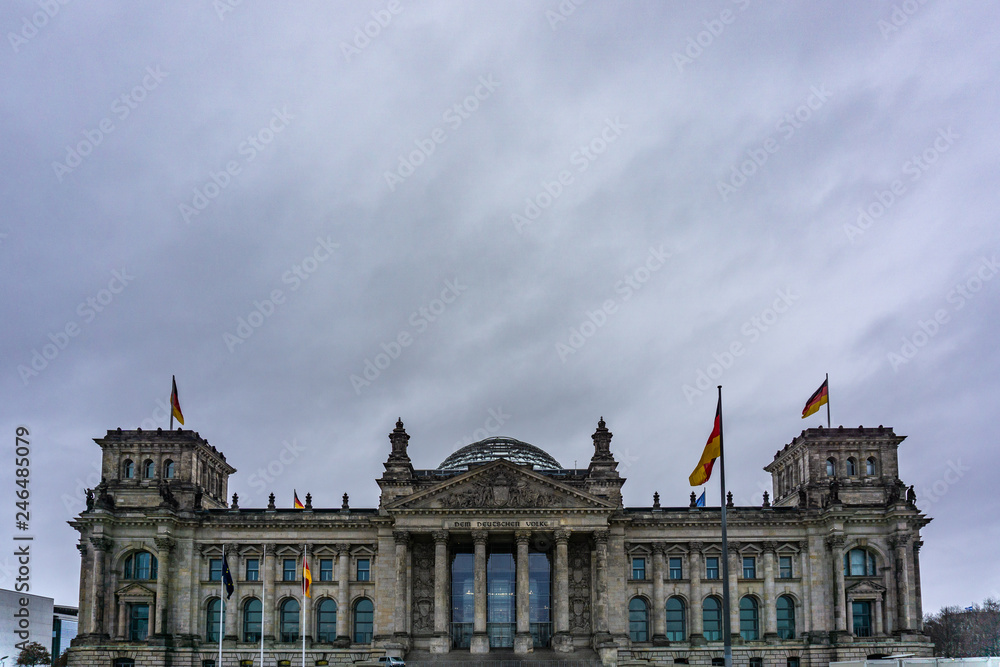Reichstag building (Bundestag, the German Parliament) in a cloudly day - Berlin, Germany