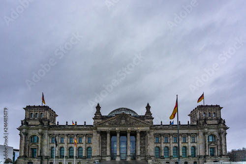 Obraz na płótnie Reichstag building (Bundestag, the German Parliament) in a cloudly day - Berlin, Germany w salonie