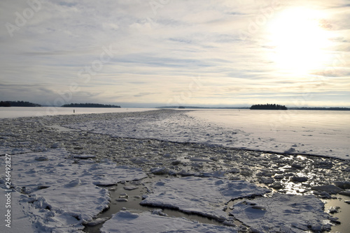 Snow on the frozen lake on a beautiful winter day. Photo taken in Vasteras  Sweden