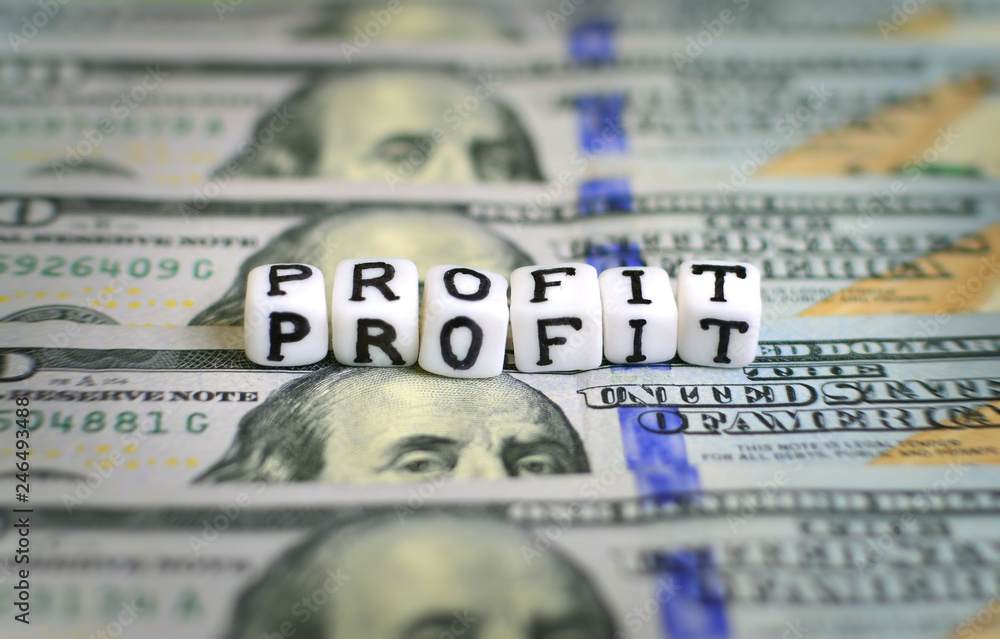 Money profit concept with dollar bills and cubes with Money profit concept with dollar bills and cubes with