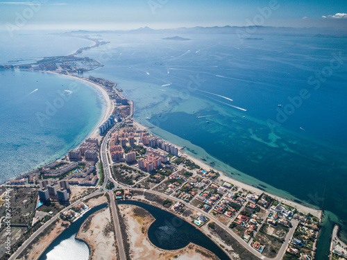 Aerial photo of buildings, villas and the beach on a natural spit of La Manga between the Mediterranean and the Mar Menor, Cartagena, Costa Blanca, Spain 11