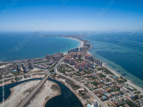 Aerial photo of buildings, villas and the beach on a natural spit of La Manga between the Mediterranean and the Mar Menor, Cartagena, Costa Blanca, Spain 16