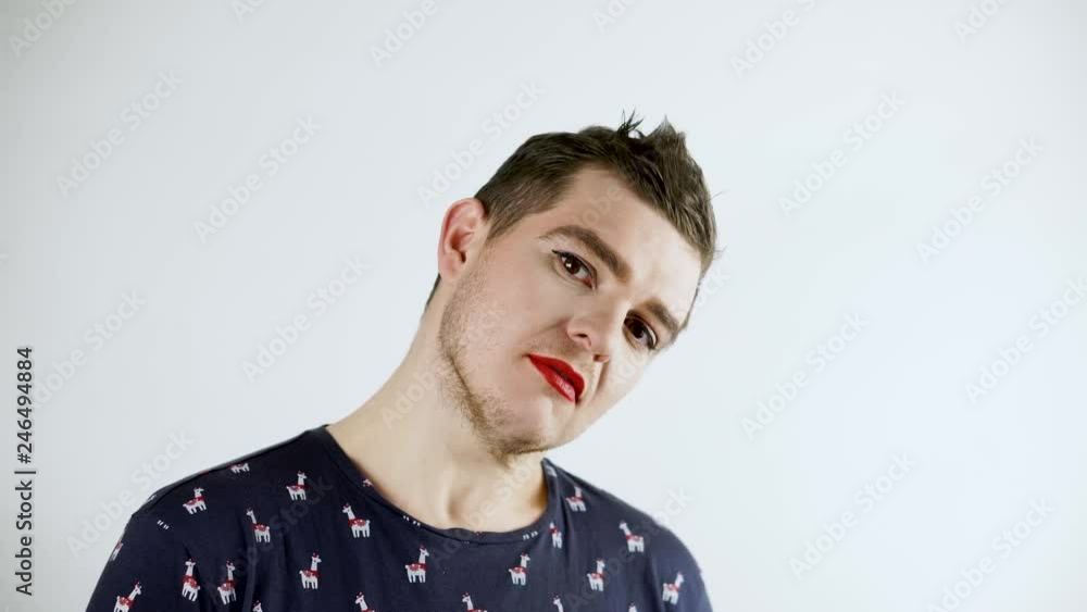 Gay. Man posing Gay with make up. Red lipstick. Gay. Man posing Gay with make up. Red lipstick.