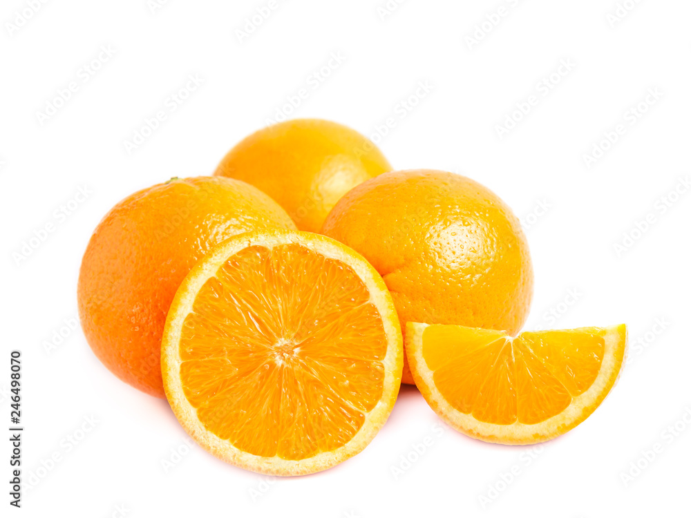Three fresh juicy oranges one half and a lobule (slice) of orange isolated on white background. Close photo Three fresh juicy oranges one half and a lobule (slice) of orange isolated on white background. Close photo