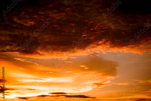 Dramatic sunset colorful red and orange sky over and cloud background multicolor evening sky