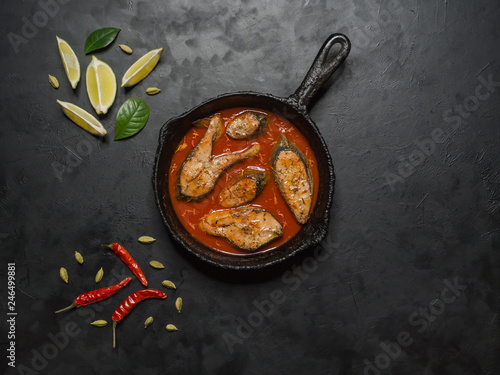 Canvas Print Top view of spicy and hot Bengali fish curry