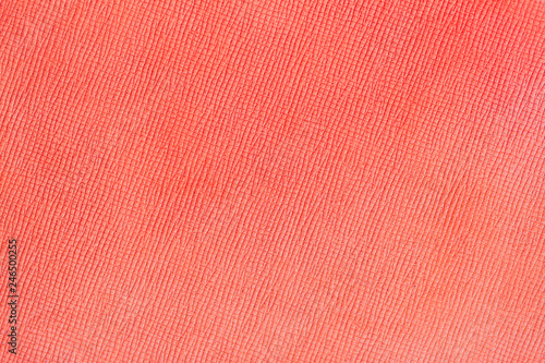 Coral orange color of leather texture, background, surface