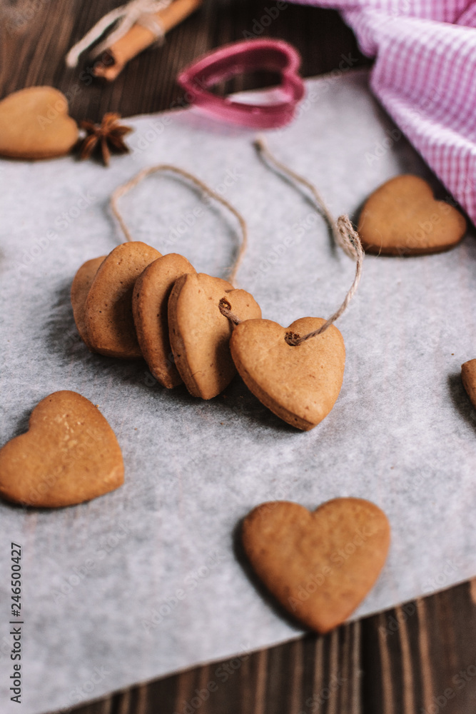 Baked cookies-hearts on the vintage wooden table. Valentine's Day