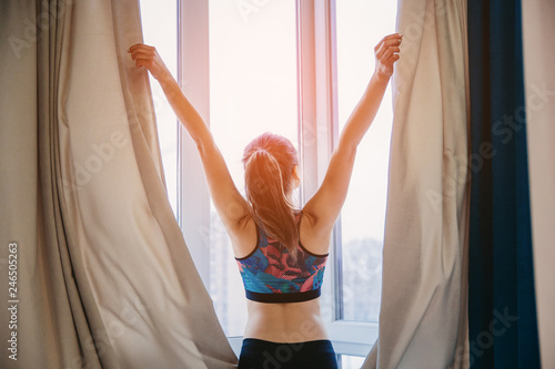 The young girl regularly sports. Morning exercise