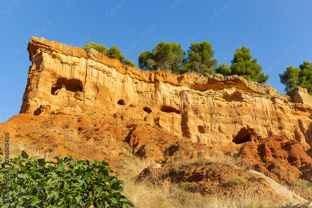 Caves in the mountain - escarpment above Anento village, province of Zaragoza, Aragon, Spain