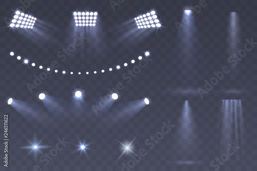 Vector Stadium spotlights. Scene spotlights set isolated on transparent background. Bright illumination. light sources for your design. Glowing stars. Eps 10.