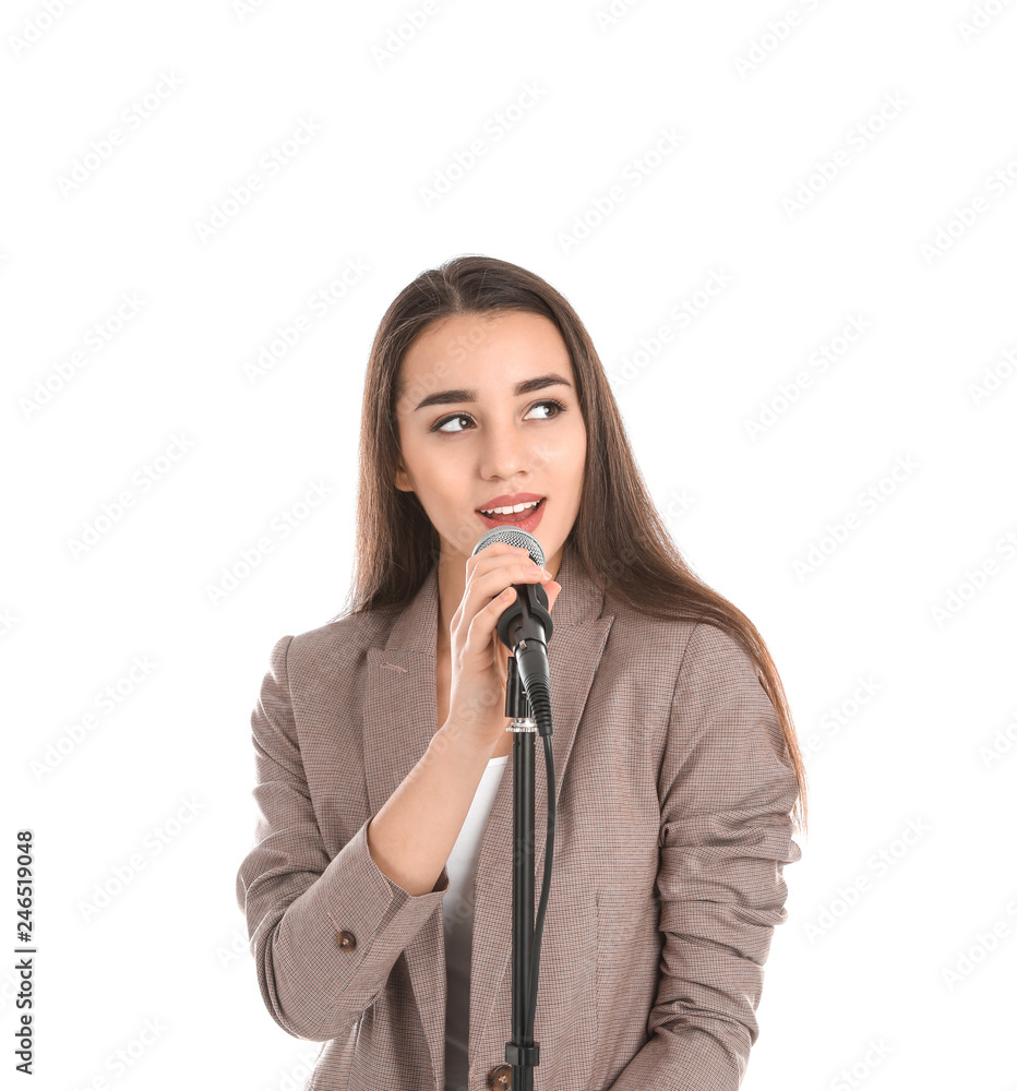 Young stylish woman singing in microphone on white background Young stylish woman singing in microphone on white background