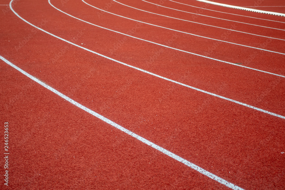 Red running track in stadium