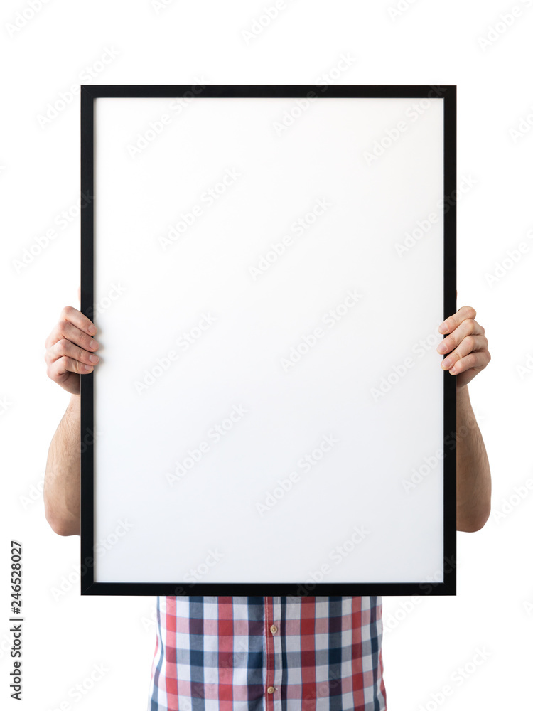Holding frame mockup. Photo Mockup. The man hold frame. For frames and posters design. Frame size 20x28 (50x70cm). Holding frame mockup. Photo Mockup. The man hold frame. For frames and posters design. Frame size 20x28 (50x70cm).
