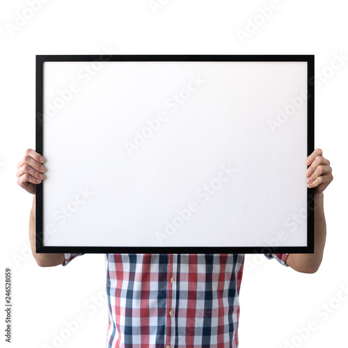 Holding frame mockup. Photo Mockup. The man hold frame. For frames and posters design. Frame size 28x20 (70x50cm).