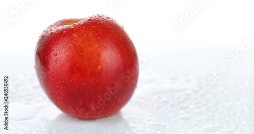 rotating red apple on white background