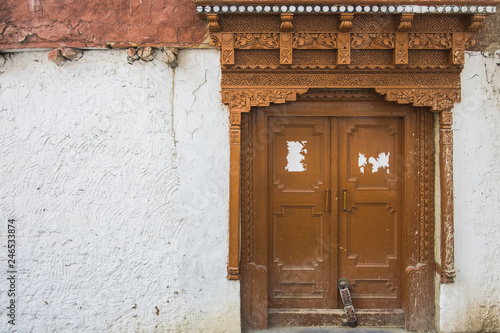 Ancient looking door way at a Tibetan monastery in Leh Ladakh, India
