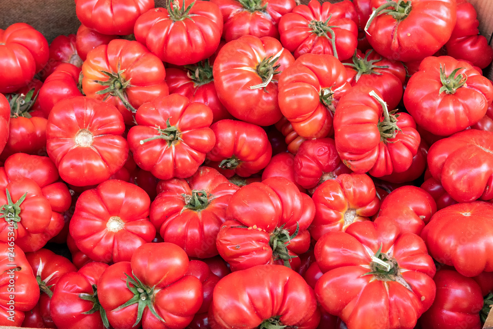 Ripped sicilian tomatoes for sale at a market Ripped sicilian tomatoes for sale at a market