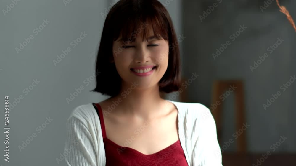 Portrait young pretty woman smiling to camera Portrait young pretty woman smiling to camera