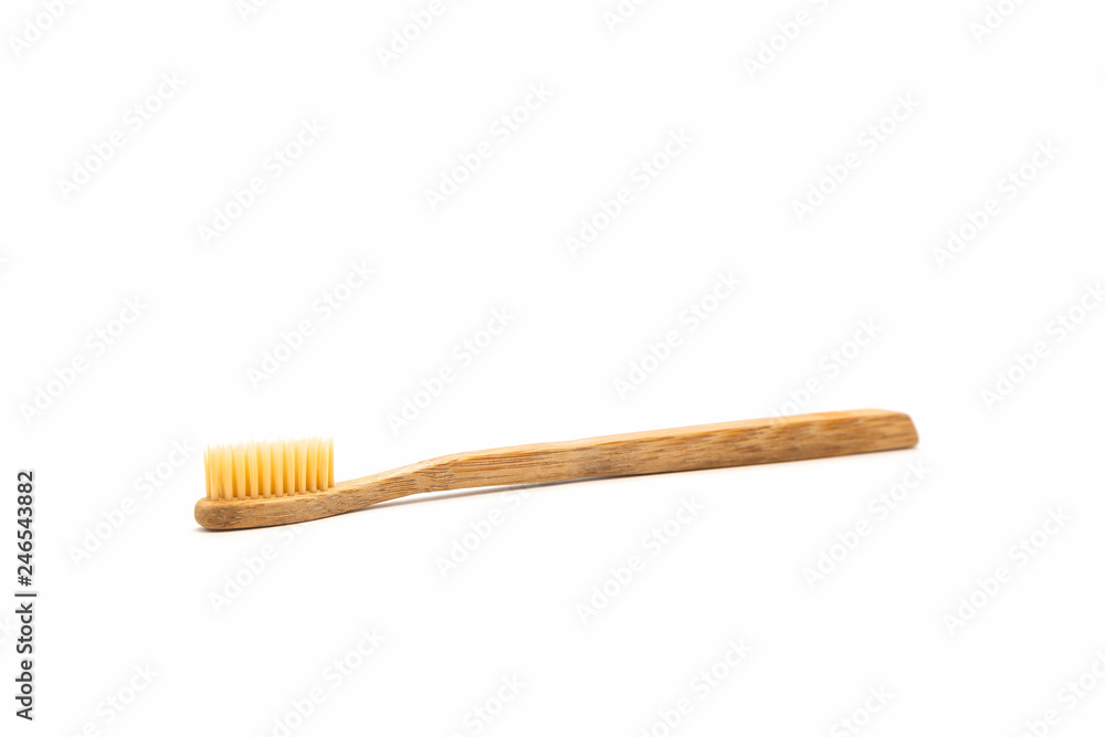 Bamboo toothbrush on white background. Bamboo toothbrush on white background.