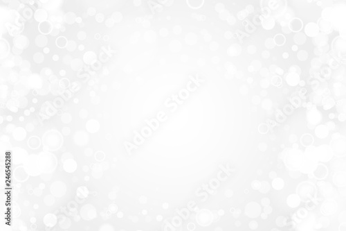 Silver and white bokeh lights defocused. Abstract background. Elegant, shiny, blurred light background. Magic christmas background. EPS 10.