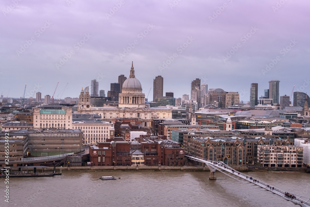Panoramic view of Saint Paul Cathedral in London and the bridge over the river Thames. View from Tate Modern museum.