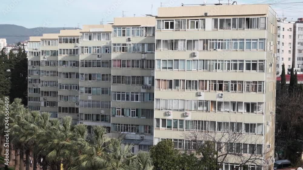 Generic exterior establishing shot of urban city high rise office or apartment building day time Generic exterior establishing shot of urban city high rise office or apartment building day time