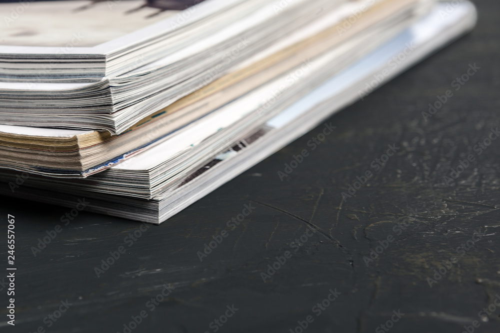 Close up stacking magazine place on table background Close up stacking magazine place on table background