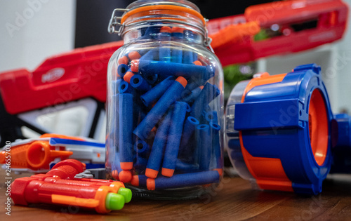 Toy gun darts in jar