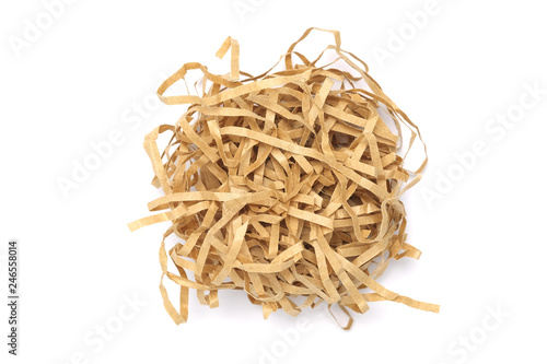 Pile of shredded paper brown color on white background, Like a bird nest.