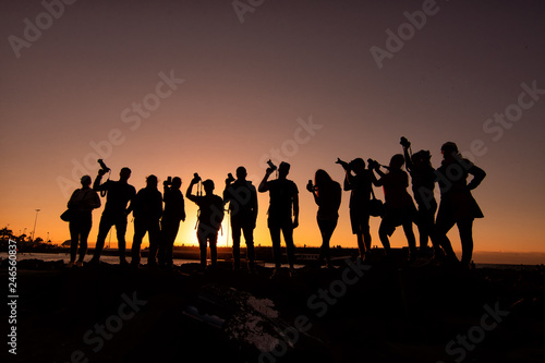 photographers at the sunset, backlighting photo