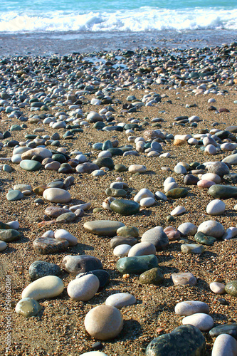 Stones on the sand by the sea