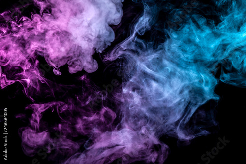 Translucent smoke rising to the top, illuminated by light on a dark background, multi-colored: blue, gray and pink, evaporating in waves exhaled from the vape. T-shirt print.