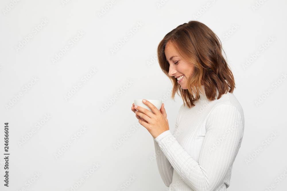portrait of happy young woman with cup of coffee portrait of happy young woman with cup of coffee