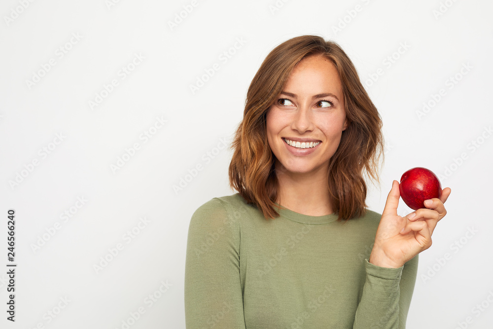 portrait of happy young woman with red apple portrait of happy young woman with red apple