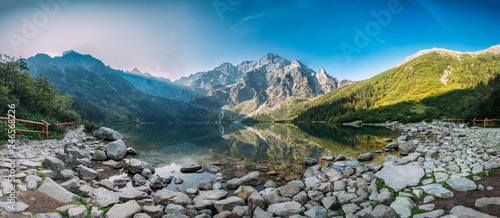 Tatra National Park, Poland. Panorama Famous Mountains Lake Morskie Oko Or Sea Eye Lake In Summer Morning. Five Lakes Valley. Beautiful Scenic Viev