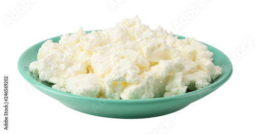 cottage cheese in blue bowl isolated on white background