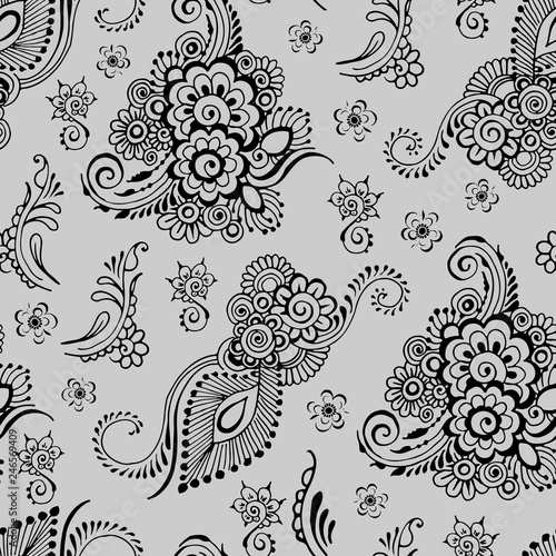 Indian floral ornament on a gray background. Seamless pattern in mehndi style.