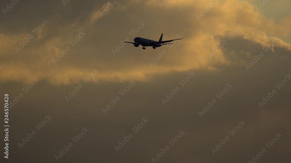 Boeing 777 of Federal Express Fedex airlines approaching to airport Boeing 777 of Federal Express Fedex airlines approaching to airport