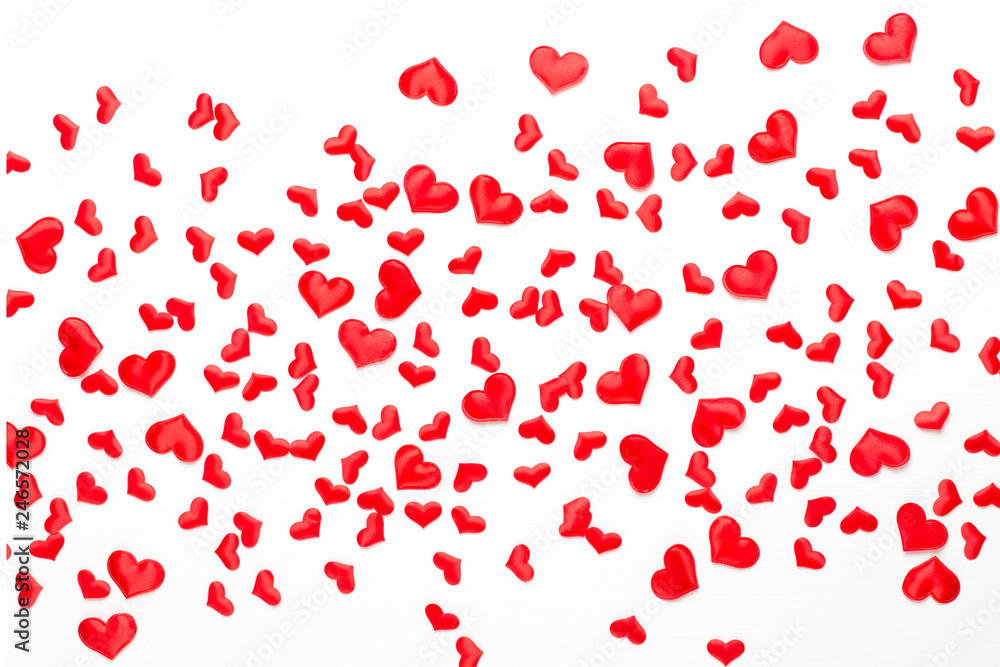 Valentines day background red hearts on wooden background.