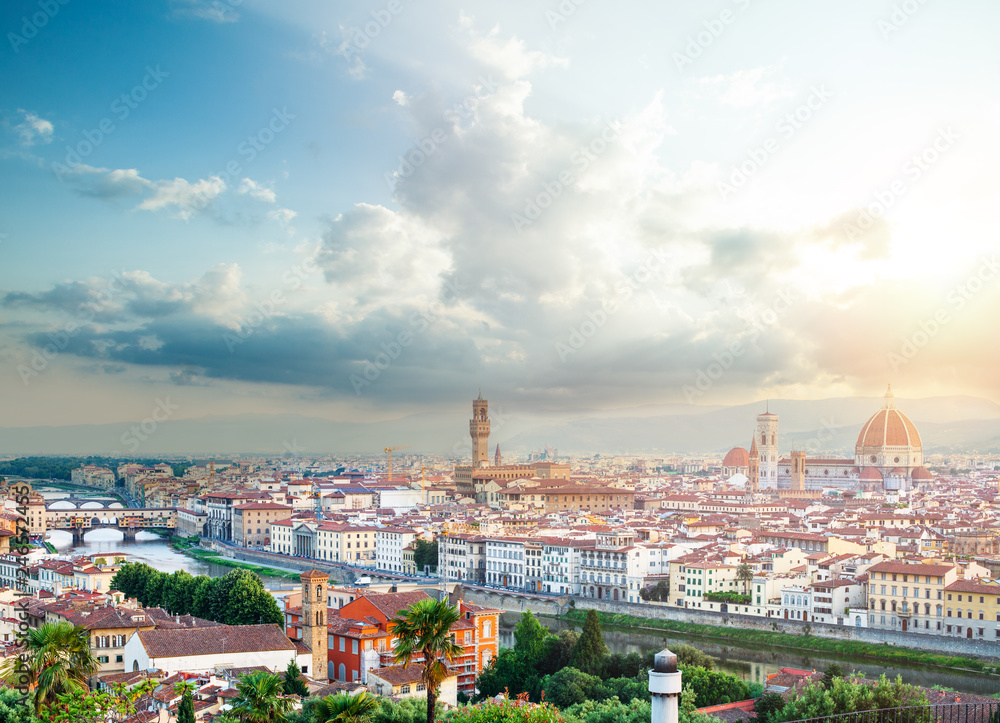 Florence cityscape. Skyline of Florence Italy with Duomo, Basilica di Santa Maria del Fiore, the bridges and cloudy sky. Firenze landmarks