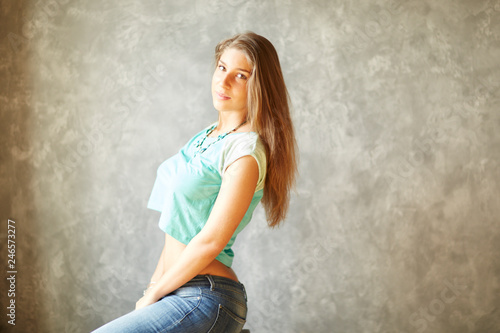 Beautiful russian girl posing for photo in the home loft studio © Alexey Tsyganov