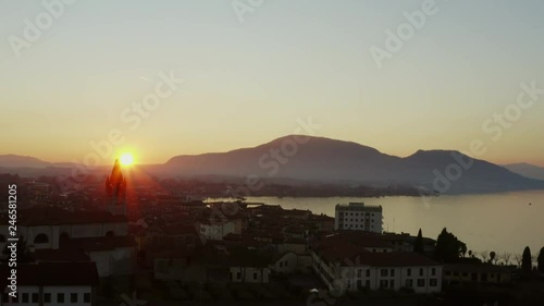 Arial shot of the sunset of Iseo Lake in wintertime 
Filmed on Dji Mavic pro 2 10 bit - 4:2:2 photo