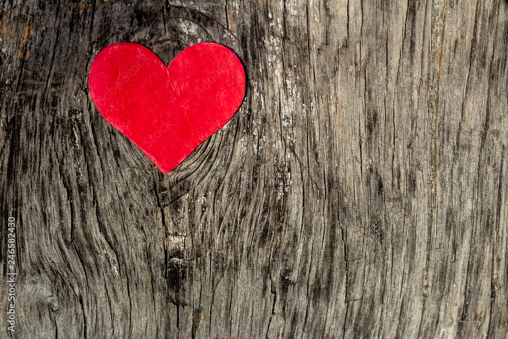 Valentines day red heart on old wood with copy space Valentines day red heart on old wood with copy space