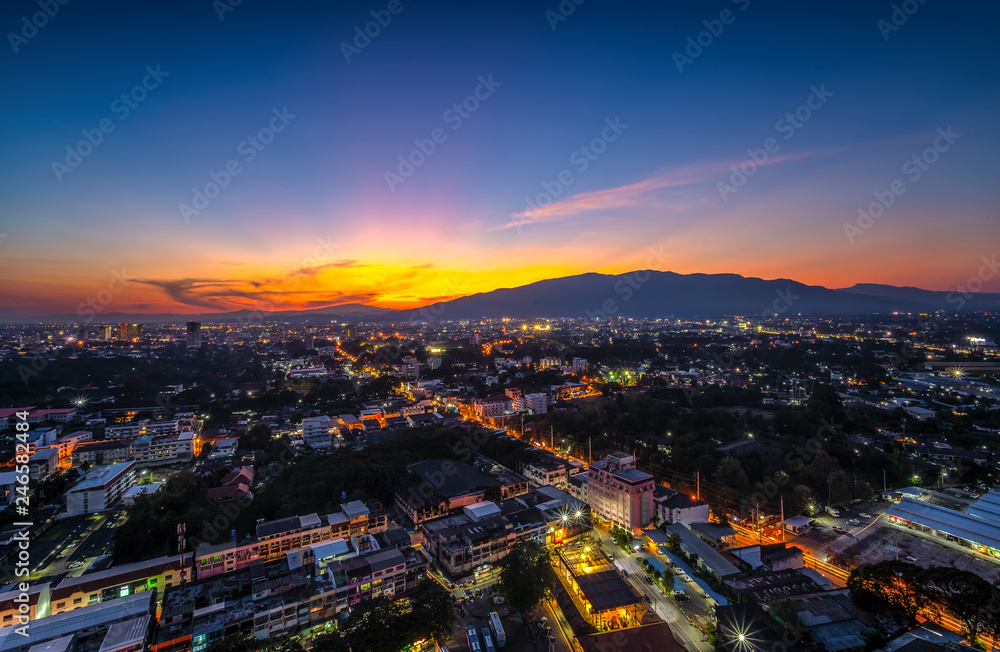 CHIANG MAI, THAILAND- JANUARY 13, 2019 : Landscape  of Chiang Mai City with sunset and building  in twilight sky.