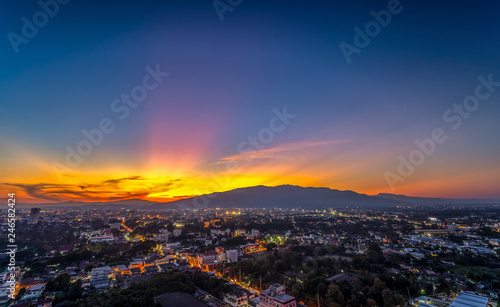 CHIANG MAI, THAILAND- JANUARY 13, 2019 : Landscape of Chiang Mai City with sunset and building in twilight sky.