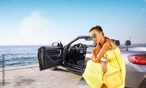 Summer car and slim young woman 